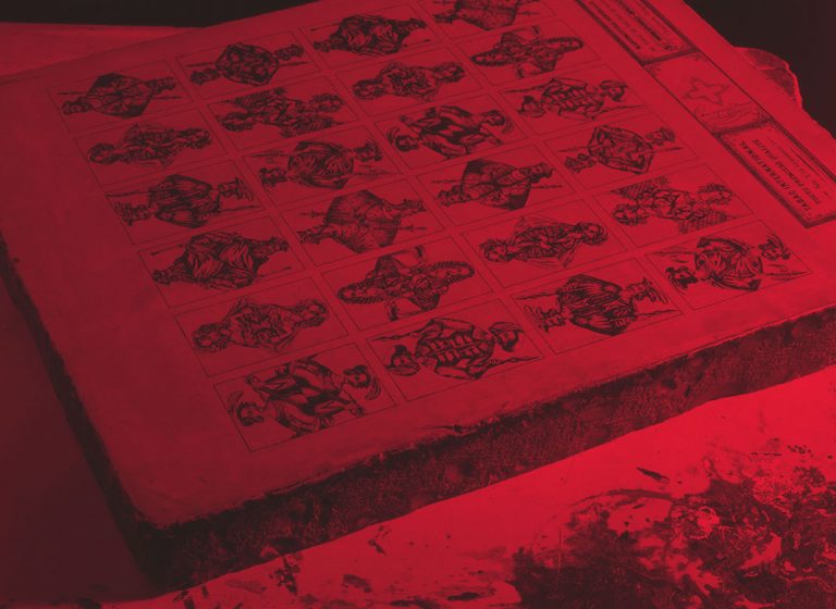 Print stone graphic of old playing cards